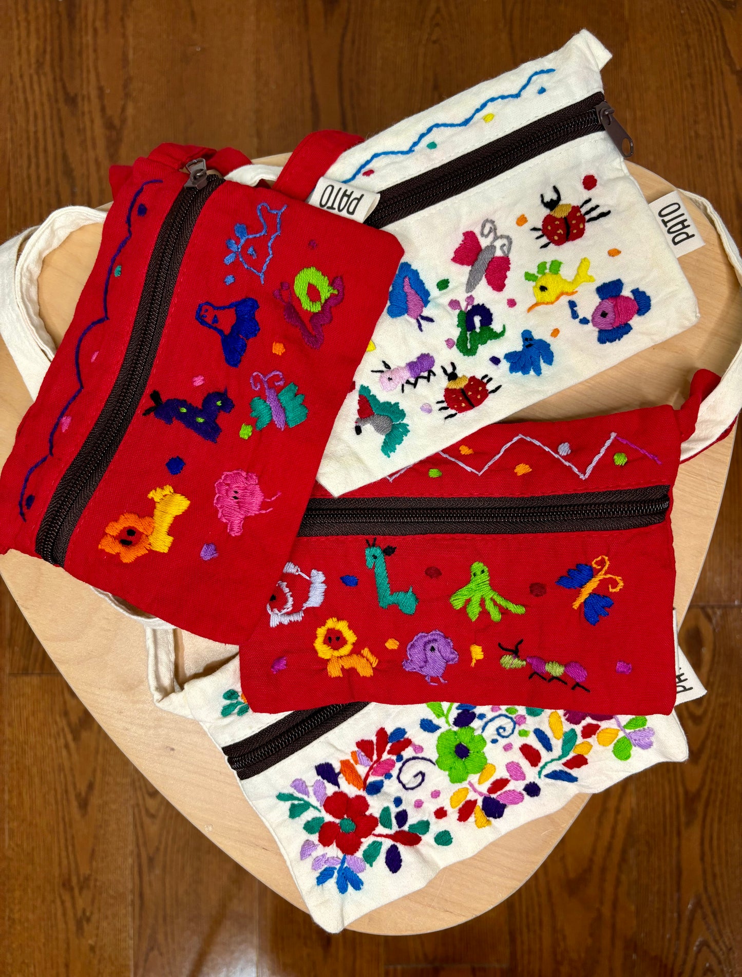 Hand embroidered zip purse